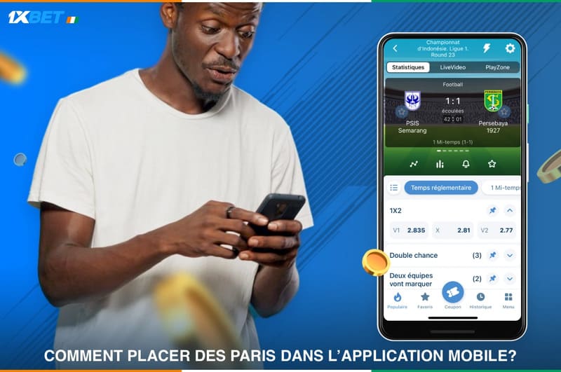 Un homme plaçant des paris sur l'application 1xbet.